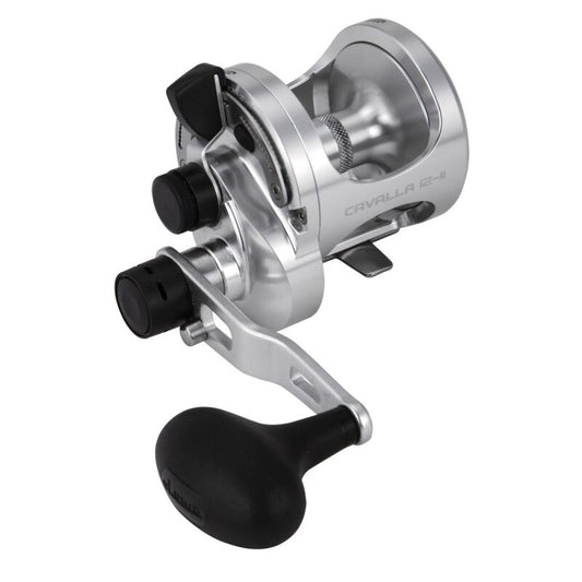 OKUMA Cavalla Lever Drag 12II RH fishing reel in silver with ergonomic black handle, dual drag system, and precision engineering.